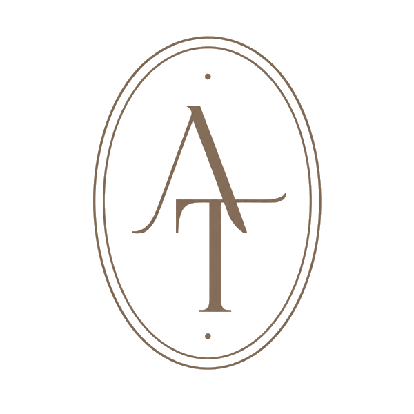 AT